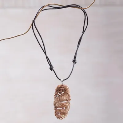 Alternate image for Bone and Leather Dragon Pendant Necklace from Indonesia Snarling Dragon